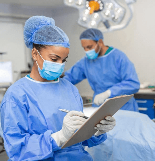 Healthcare professionals in operating room.
